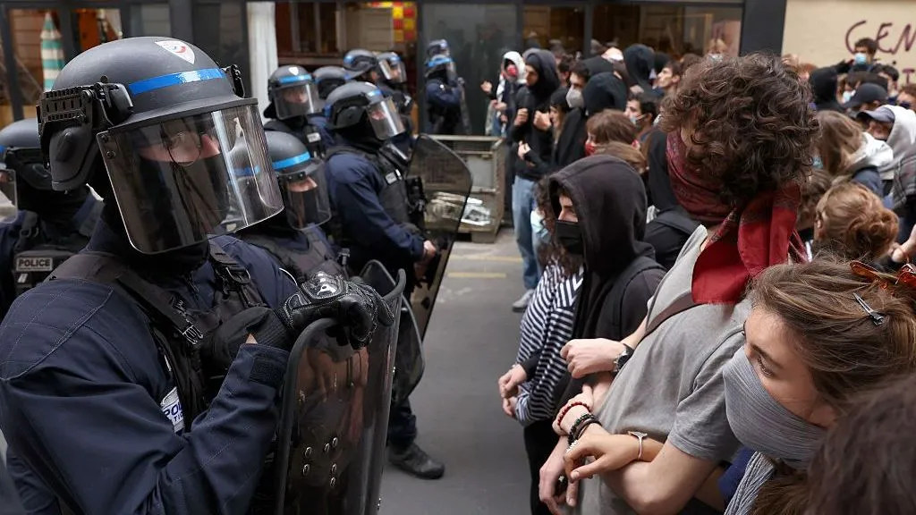 France police blow off  boy's hand as student protests continue