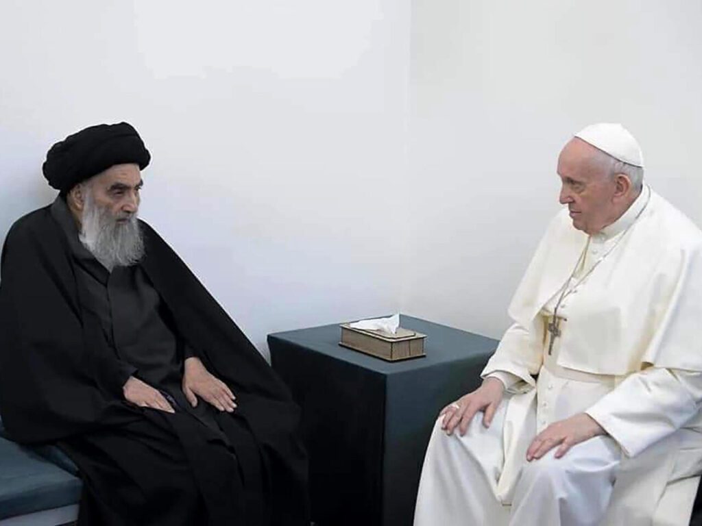 Pope Francis right met with Shiite Muslim leader Grand Ayatollah Ali al Sistani in Najaf Iraq 6 March 2021 AP Photo