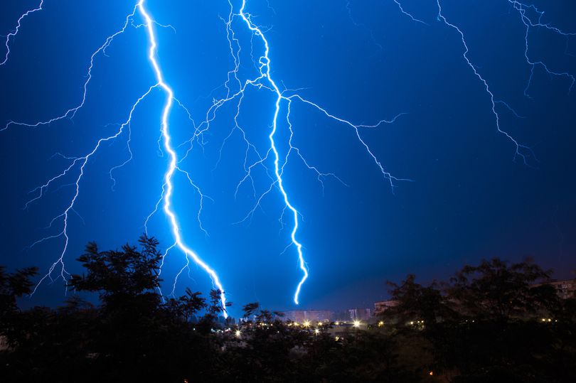 0 Lightning discharges during a large rainstorm in a city with forest fringes