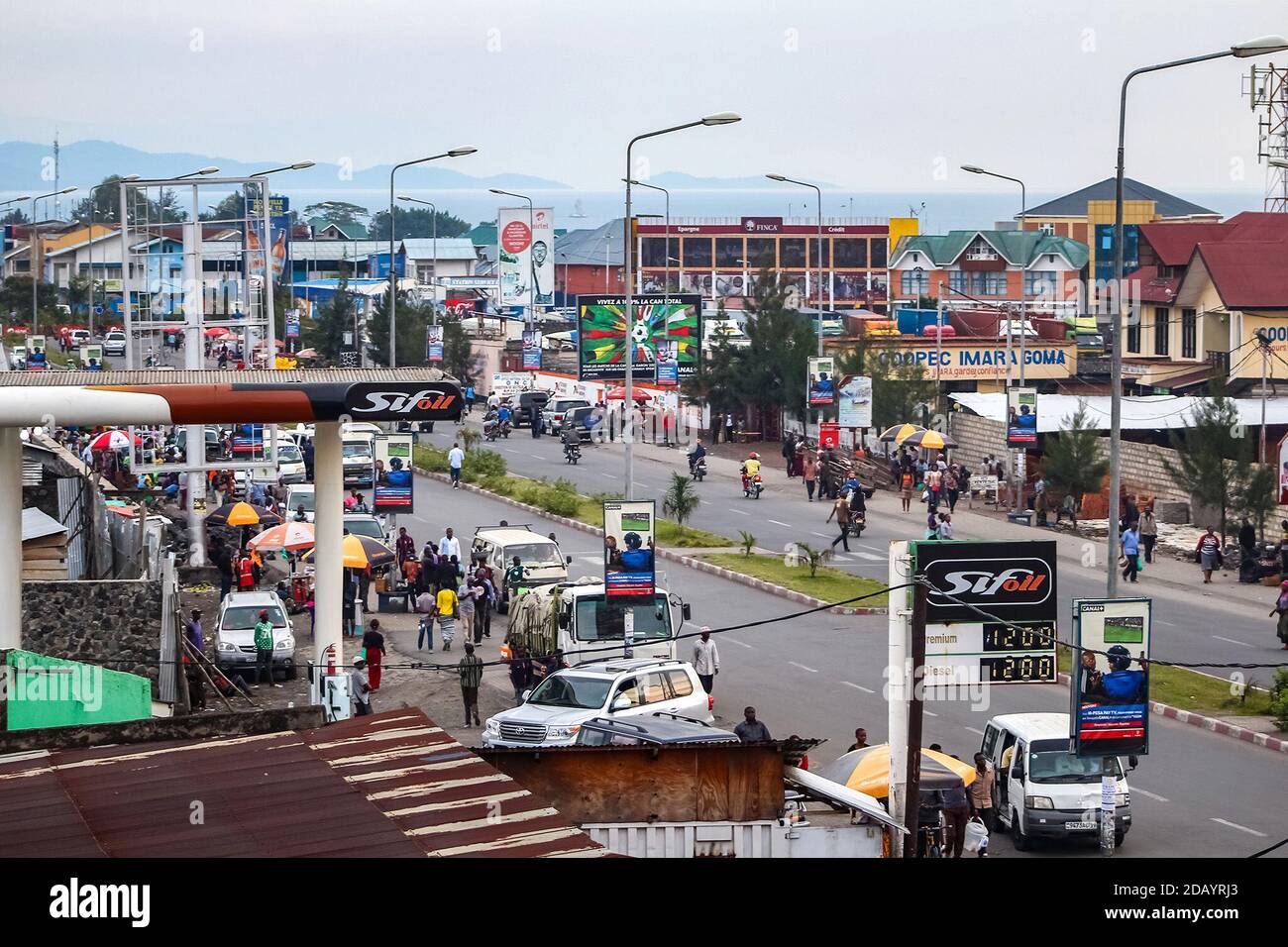 the city center of goma democratic republic of congo includes fuel stations for gas shops markets traffic and private homes 2DAYRJ3