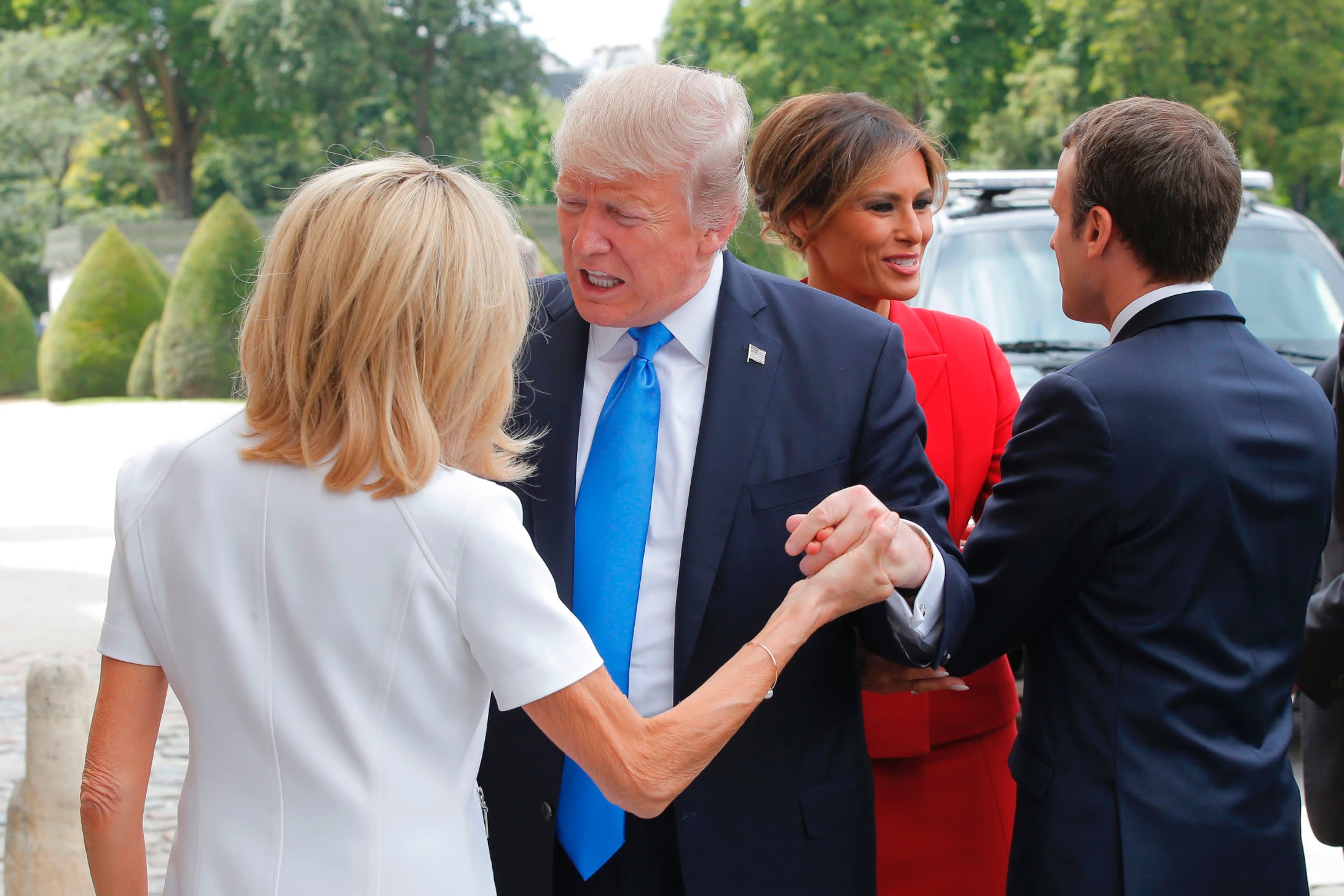 170713110236 trump macron handshake