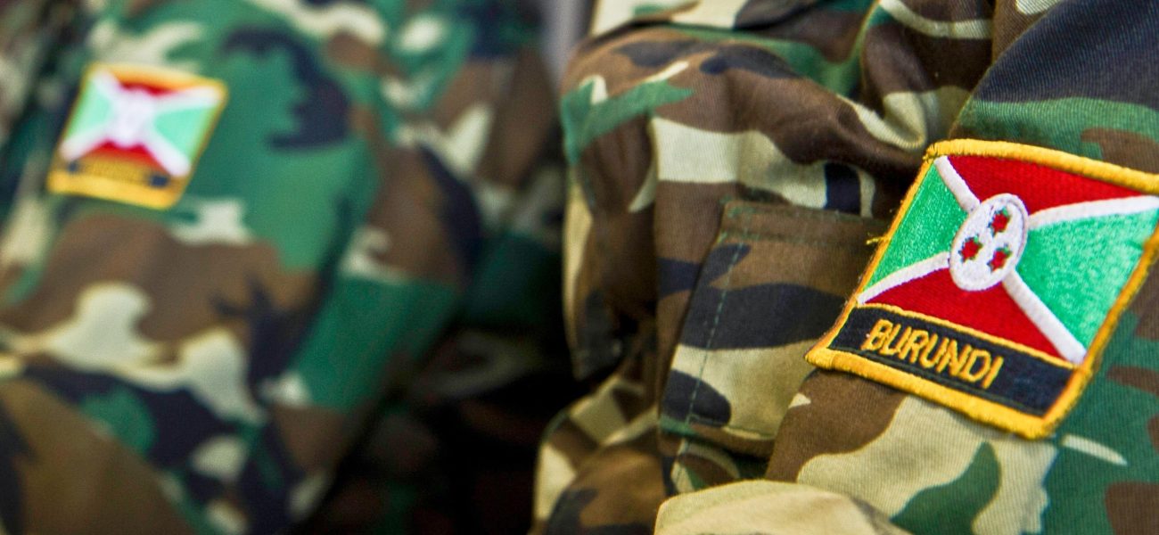 Burundi soldiers await take off in a C-17 Globemaster Dec. 13, 2013 at Bujmumbura Airport, Burundi. In coordination with the French military and African Union, the U.S. military provided airlift support to transport Burundi soldiers, food and supplies in the Central African Republic (CAR). This support is aimed at enabling African forces to deploy promptly to prevent further spread of sectarian violence and restore security in CAR. (U.S. Air Force photo by Staff Sgt. Erik Cardenas/Not Released)