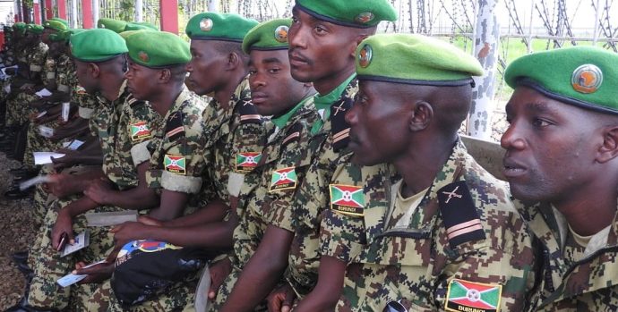 BUJUMBURA, BURUNDI - FEBRUARY 16: The soldiers of the 40th battalion of the Burundian Army wait for the plane which belongs to United Nations (UN), at Bujumbura International Airport before departing from Bujumbura to Somalia ahead of replacing soldiers of 34th battalion for their duty under the African Union Mission in Somalia (AMISOM), in Bujumbura, Burundi on February 16, 2017. Renovat Ndabashinze / Anadolu Agency