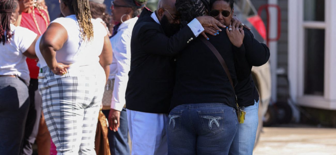 Mourners gather after children, with ages ranging from 1 to 14, were killed in a mass shooting incident described as domestic violence, in Shreveport, Louisiana, U.S. April 19, 2026.  REUTERS/Kevin Bartram