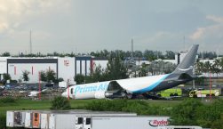 An Amazon cargo plane sits at the Miami International Airport (MIA) after it overshot the runway, Sunday, Sept. 6, 2026. (AP Photo/Lynne Sladky)