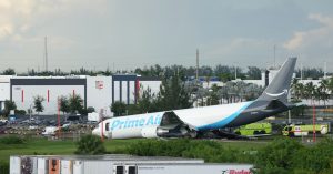 An Amazon cargo plane sits at the Miami International Airport (MIA) after it overshot the runway, Sunday, Sept. 6, 2026. (AP Photo/Lynne Sladky)