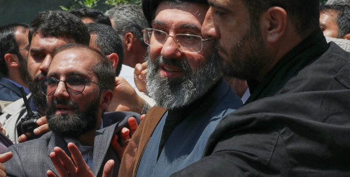 Mojtaba Khamenei, the son of Iran's Supreme Leader, Ayatollah Ali Khamenei, center, attends the annual Quds, or Jerusalem Day, rally in Tehran, Iran, May 31, 2019. (AP Photo/Vahid Salemi)