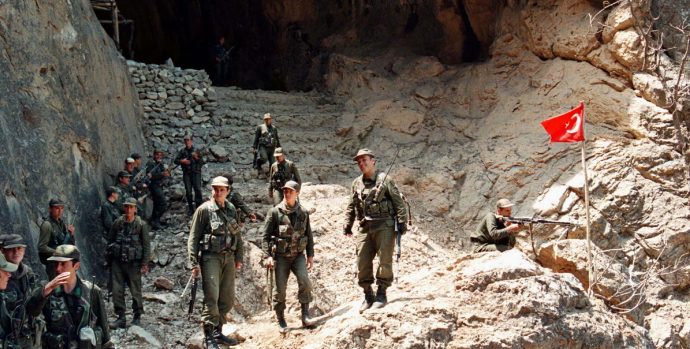 Turkish soldiers stand before a giant cave at the rugged Zap camp in the northern Iraq, 25 kms south of Turkish border, after they captured it from the Kurdish PKK rebels May 24. Turkish forces last week started a cross-border military operation in the northern Iraq used as a base by Kurdish rebels to attack their targets in Turkey.

TURKEY