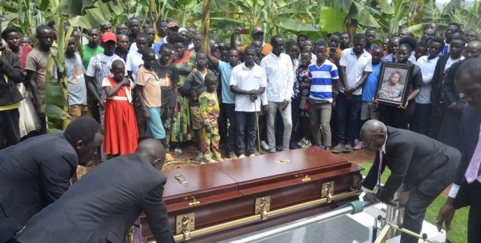 Lt-Arihos-body-being-lowered-into-a-grave-in-Rukiga-district-this-past-weekend-