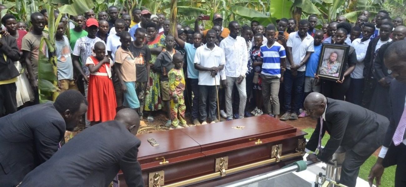 Lt-Arihos-body-being-lowered-into-a-grave-in-Rukiga-district-this-past-weekend-