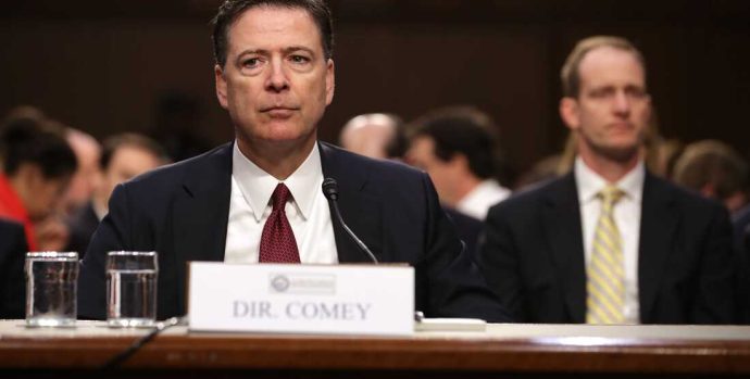 WASHINGTON, DC - JUNE 08:  Former FBI Director James Comey testifies before the Senate Intelligence Committee in the Hart Senate Office Building on Capitol Hill June 8, 2017 in Washington, DC. Comey said that President Donald Trump pressured him to drop the FBI's investigation into former National Security Advisor Michael Flynn and demanded Comey's loyalty during the one-on-one meetings he had with president.  (Photo by Chip Somodevilla/Getty Images)