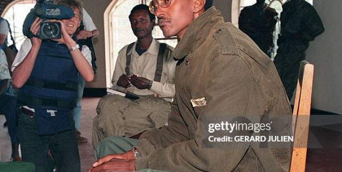 A picture taken 11 May 1994 in Buymba of Paul Kagame, leader of the Tutsi-led RPF (Rwandan Patriotic Front) during a meeting with UN High Commissioner for Human Rights Jose Ayala Lasso (not pictured). After a week that saw strained ties between Rwanda and France snap over an indictment call on President Paul Kagame over alleged complicity in the death of his predecessor, local media rallied in support of the government and poured scorn on Paris. French Foreign Minister Philippe Douste-Blazy 26 November 2006 said he regretted Rwanda's decision to cut diplomatic ties, forcing French envoys and educational staff to repatriate in haste.  AFP PHOTO / FILES GERARD JULIEN        (Photo credit should read GERARD JULIEN/AFP via Getty Images)
