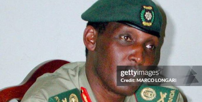 (FILES) A picture taken on January 4, 2001 shows Rwandan Army Chief of Staff, Major General Kayumba Nyamwansa during a press conference in Camp Kigali. The former chief of staff, who is now Rwandan ambassador in India, Faustin Kayumba Nyamwasa fled to South Africa, via Uganda and then Kenya, an official Rwandan source said on March 2, 2010 in Kampala. AFP PHOTO FILES / MARCO LONGARI        (Photo credit should read MARCO LONGARI/AFP via Getty Images)
