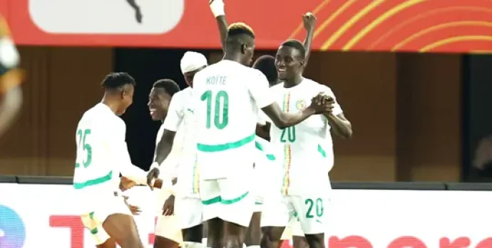 oumar-ba-of-senegal-celebrates-goal-with-teammates-during-the-2024-african-nations-championship-chan-football-quarter-final-match-between-uganda-and-senegal-at-the-mandela-national-stadium