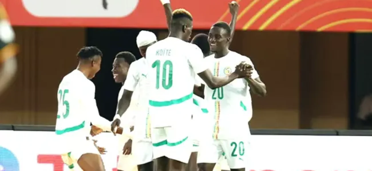 oumar-ba-of-senegal-celebrates-goal-with-teammates-during-the-2024-african-nations-championship-chan-football-quarter-final-match-between-uganda-and-senegal-at-the-mandela-national-stadium
