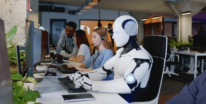 robot-working-computer-among-people-600nw-2229125163 0
