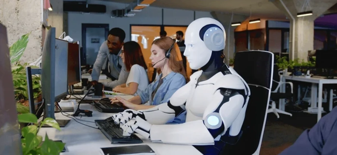 robot-working-computer-among-people-600nw-2229125163 0