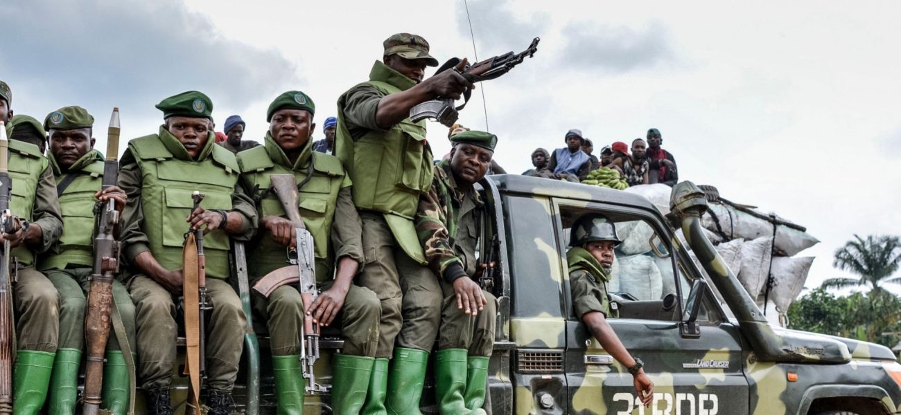 soldiers-of-the-fardc-sit-on-military-vehicle