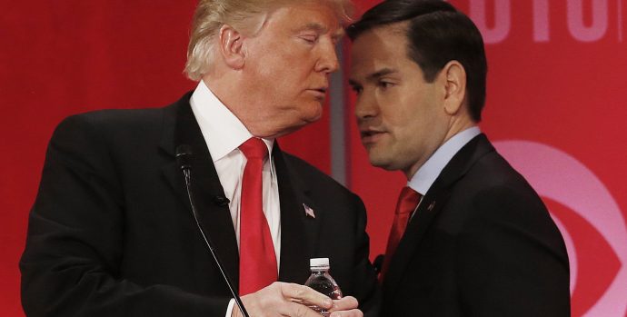 Republican presidential candidate, Sen. Marco Rubio, R-Fla., right, right, speaks to Republican presidential candidate, businessman Donald Trump  during a commercial break during the CBS News Republican presidential debate at the Peace Center, Saturday, Feb. 13, 2016, in Greenville, S.C. (AP Photo/John Bazemore)