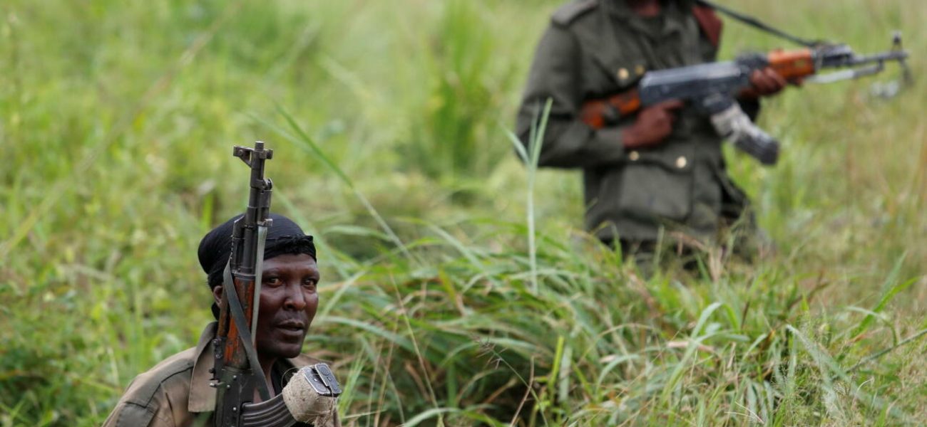 FILE PHOTO: Armed Forces of the Democratic Republic of the Congo (FARDC) soldiers rest next to a road after Islamist rebel group called the Allied Democratic Forces (ADF) attacked area around Mukoko village, North Kivu province of Democratic Republic of Congo, December 11, 2018.   REUTERS/Goran Tomasevic/File Photo